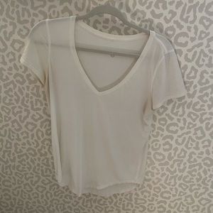 Lululemon white top, paired with a cute sports bra underneath and tied